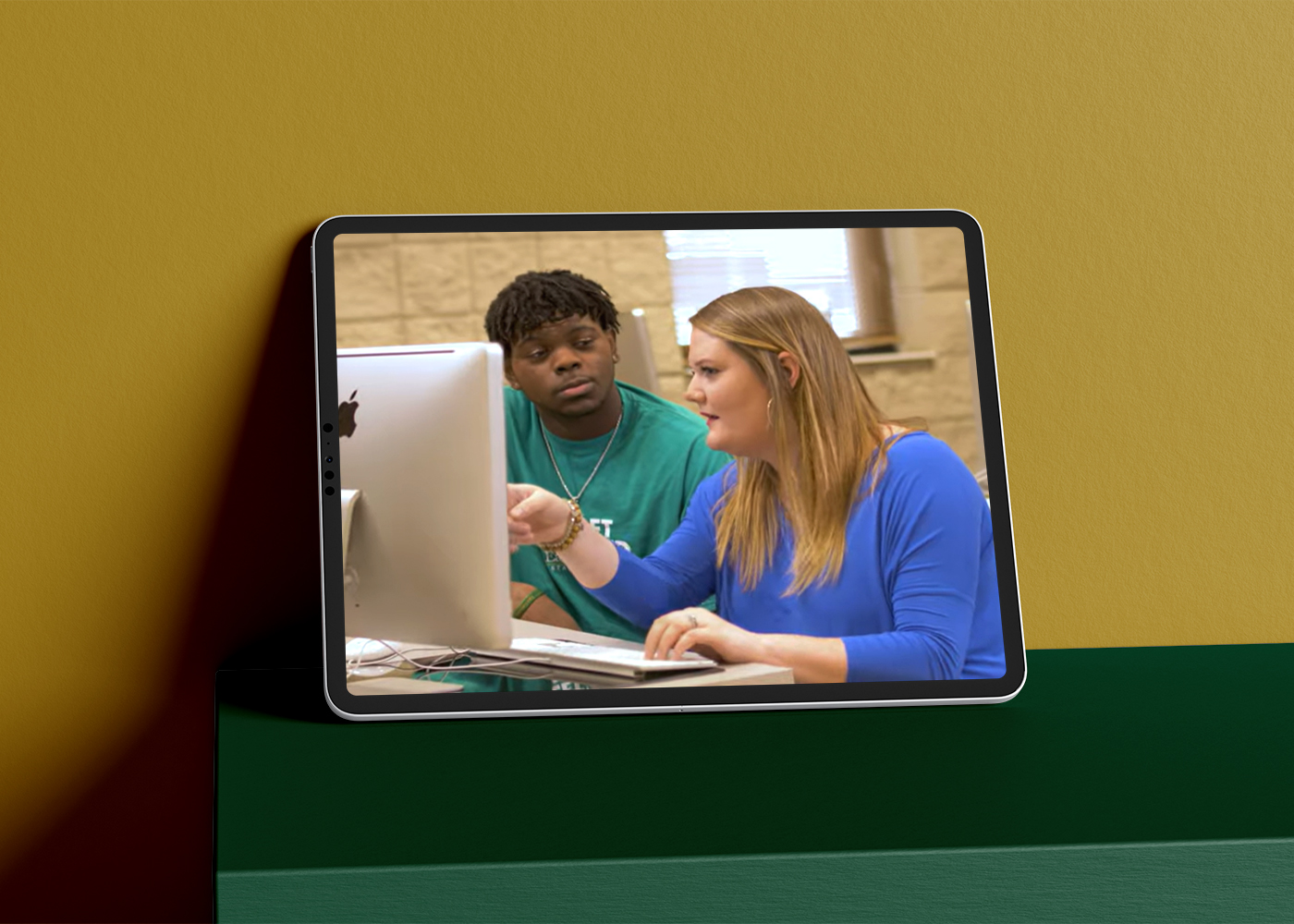 Tablet displaying student and tutor at East Georgia State College campus video